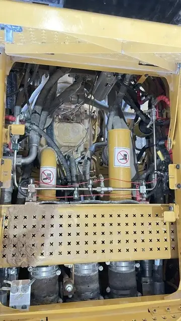 Cylinders and lines behind the rear grille