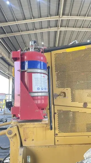 Foam cylinder in its bracket on the side of a machine
