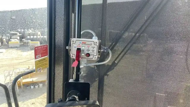 Manual actuator and fire instructions mounted at the cab